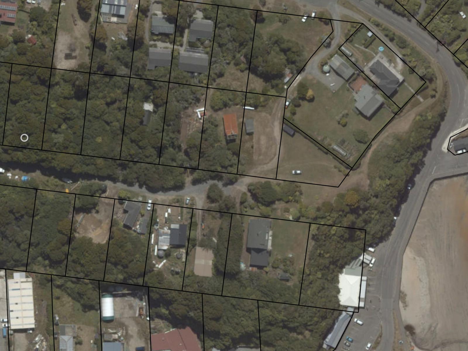 Aerial view of 7 Rata Street, a bush-clad section in the Oban township, Stewart Island